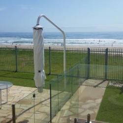 Umbrella folded down surfers Queensland